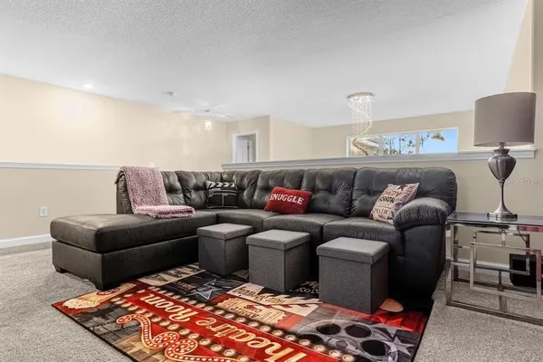 a view of a floor to ceiling window and wooden floor