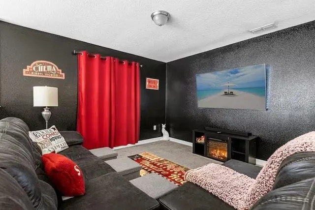 a kitchen with a stove and a table