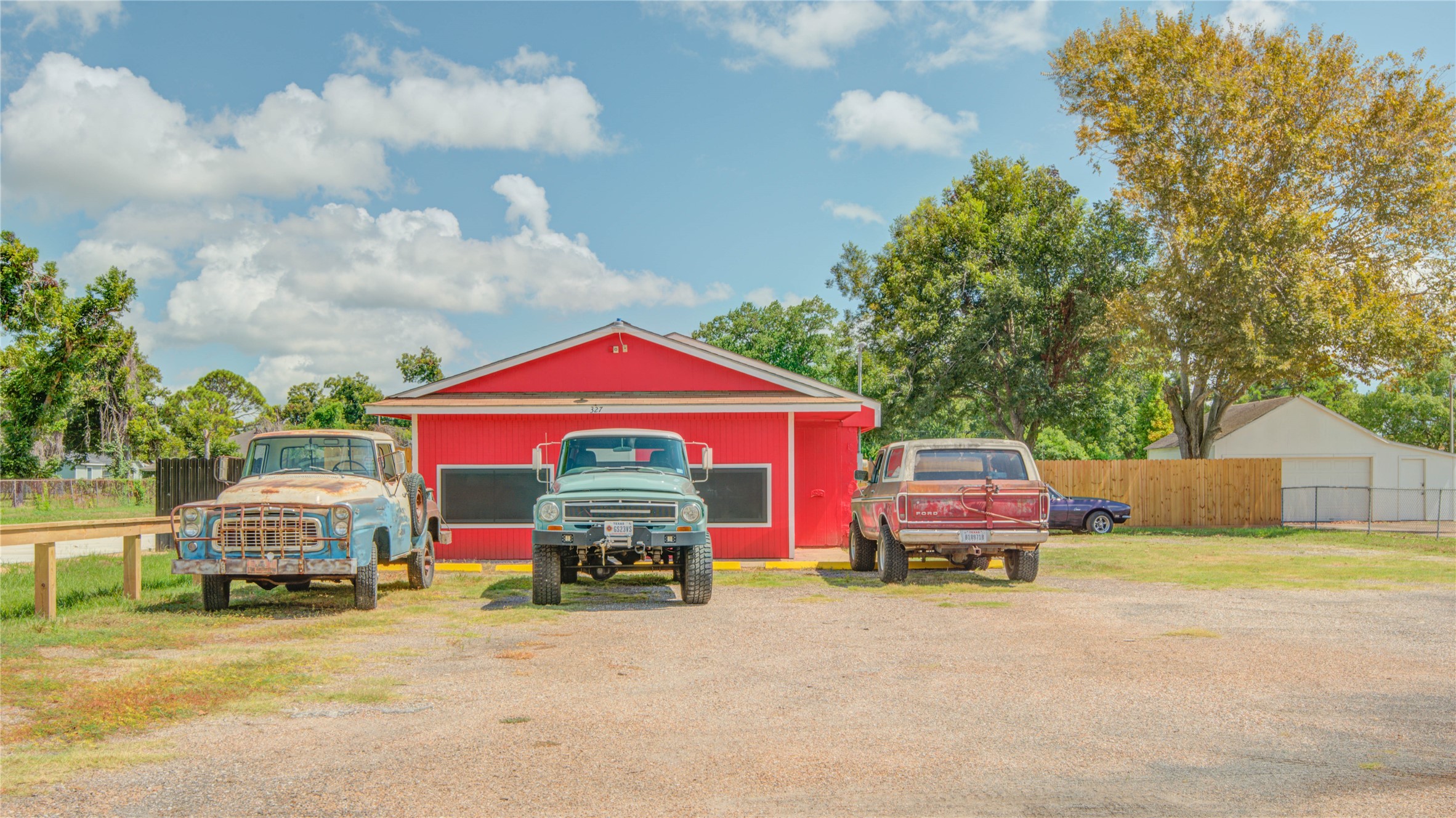 327 South Main Street Clute, TX 77531 - Photo 13 of 31 a front view of a house with cars parked