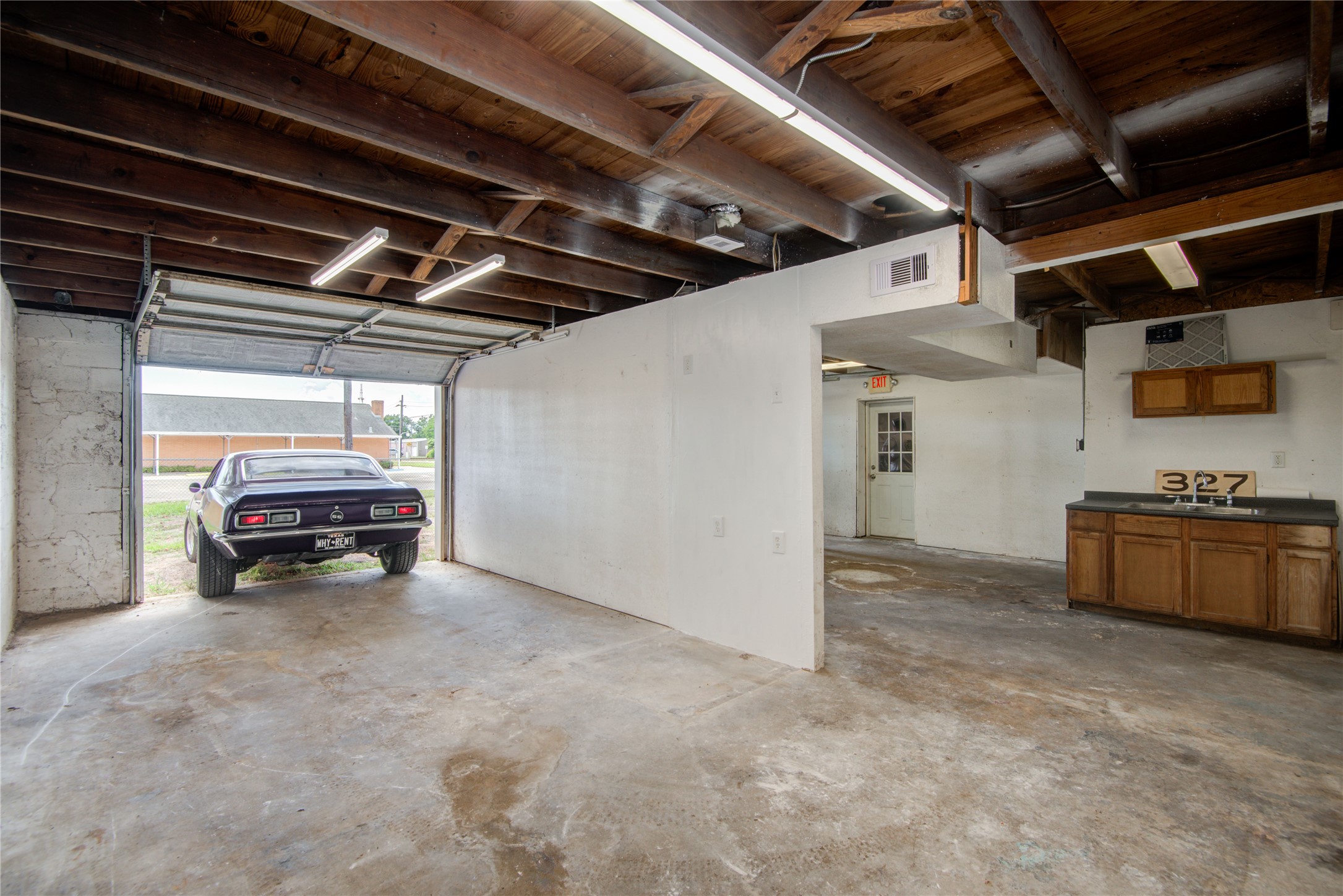 327 South Main Street Clute, TX 77531 - Photo 15 of 31 a view of car garage