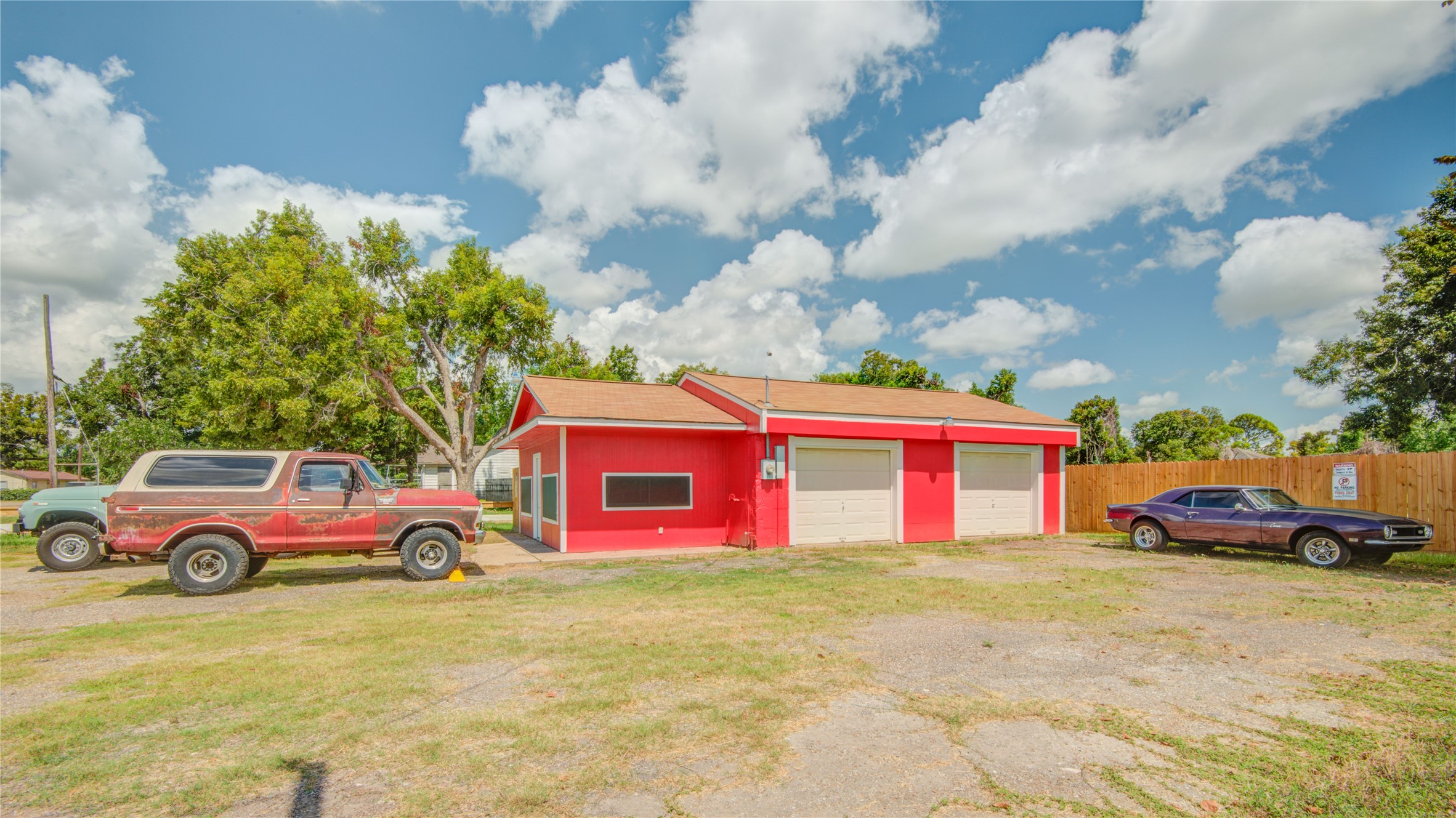327 South Main Street Clute, TX 77531 - Photo 20 of 31 a front view of a house with a yard and garage