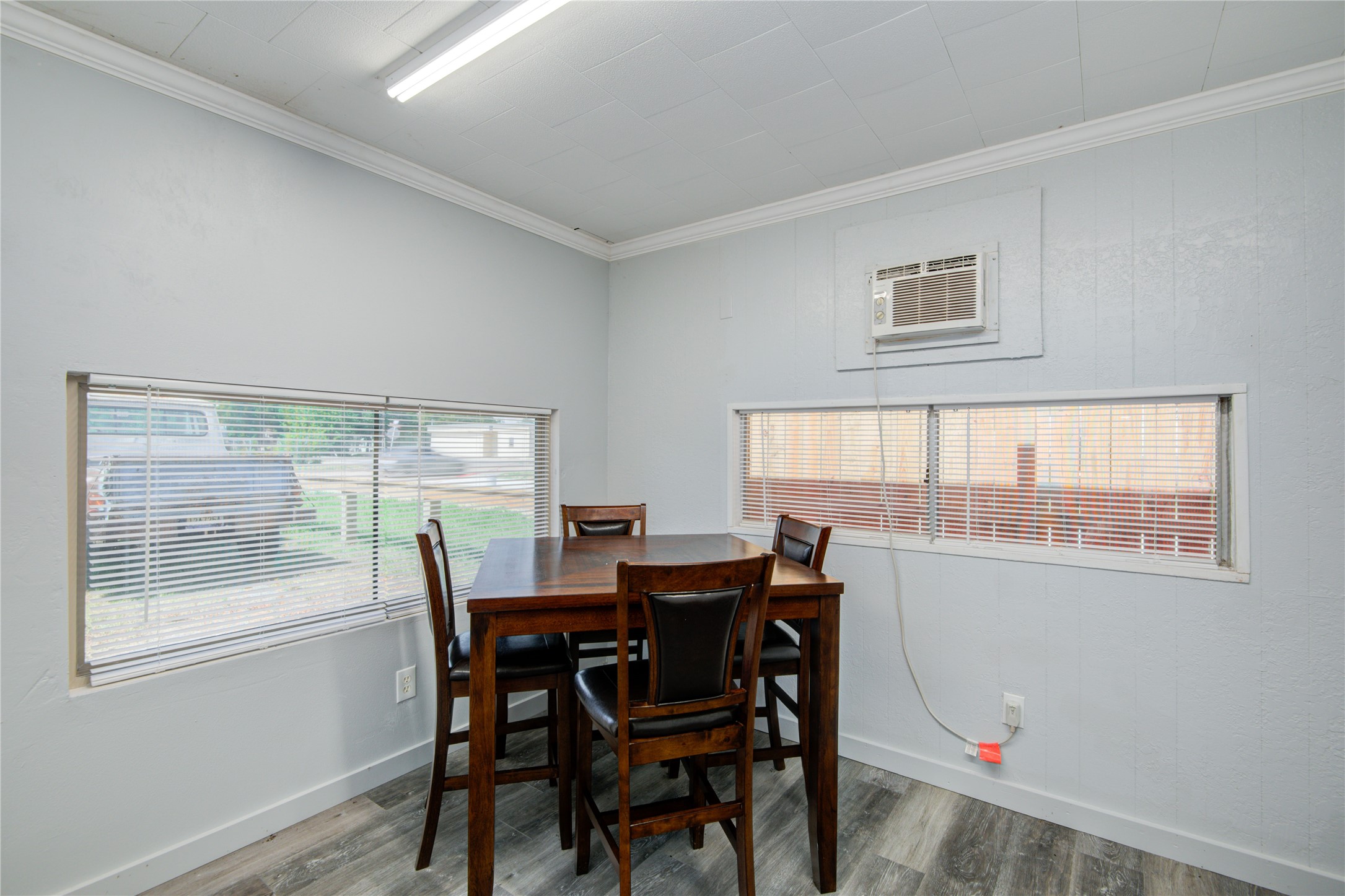 327 South Main Street Clute, TX 77531 - Photo 30 of 31 a view of a dining room with furniture and a window