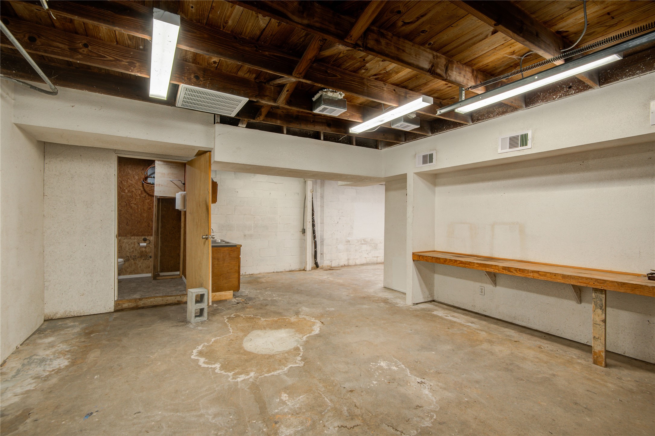 327 South Main Street Clute, TX 77531 - Photo 8 of 31 a view of an empty room with wooden floor