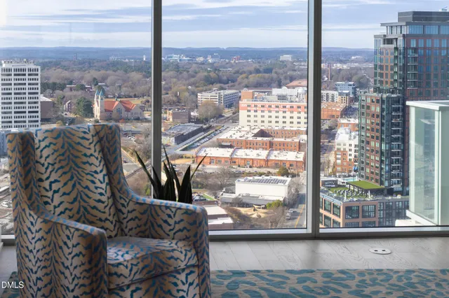 a view of a city skyline from a balcony