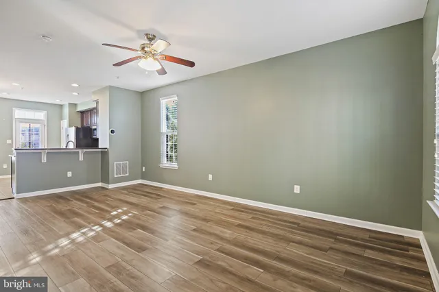 a view of a livingroom with a kitchen