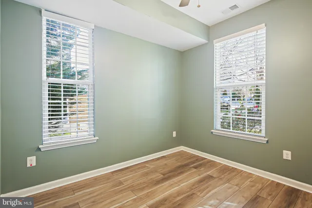 a view of a room with windows