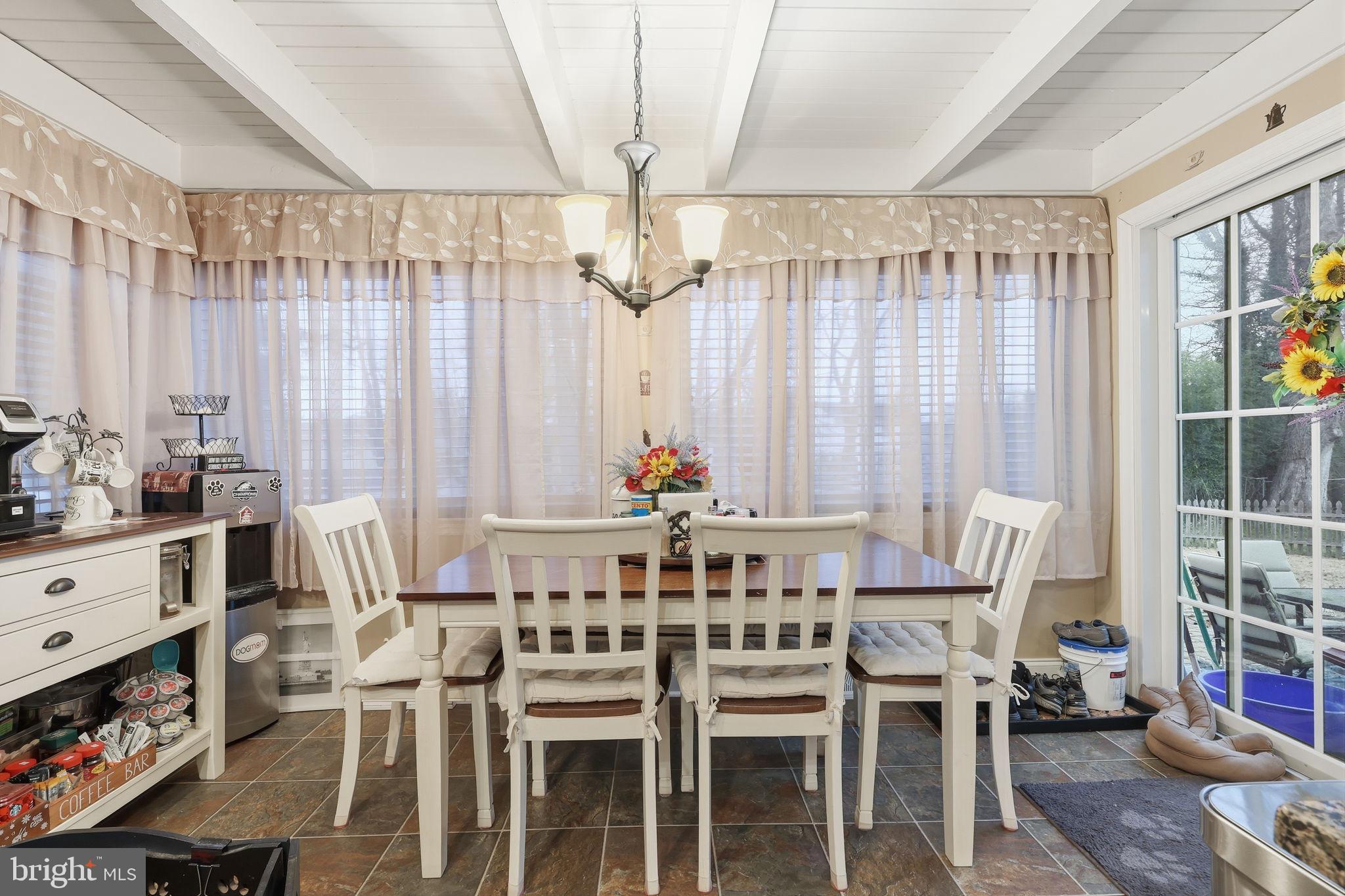 103 Greenvale Road Cherry Hill, NJ 08034 - Photo 14 of 36 a view of a dining room with furniture window and wooden floor