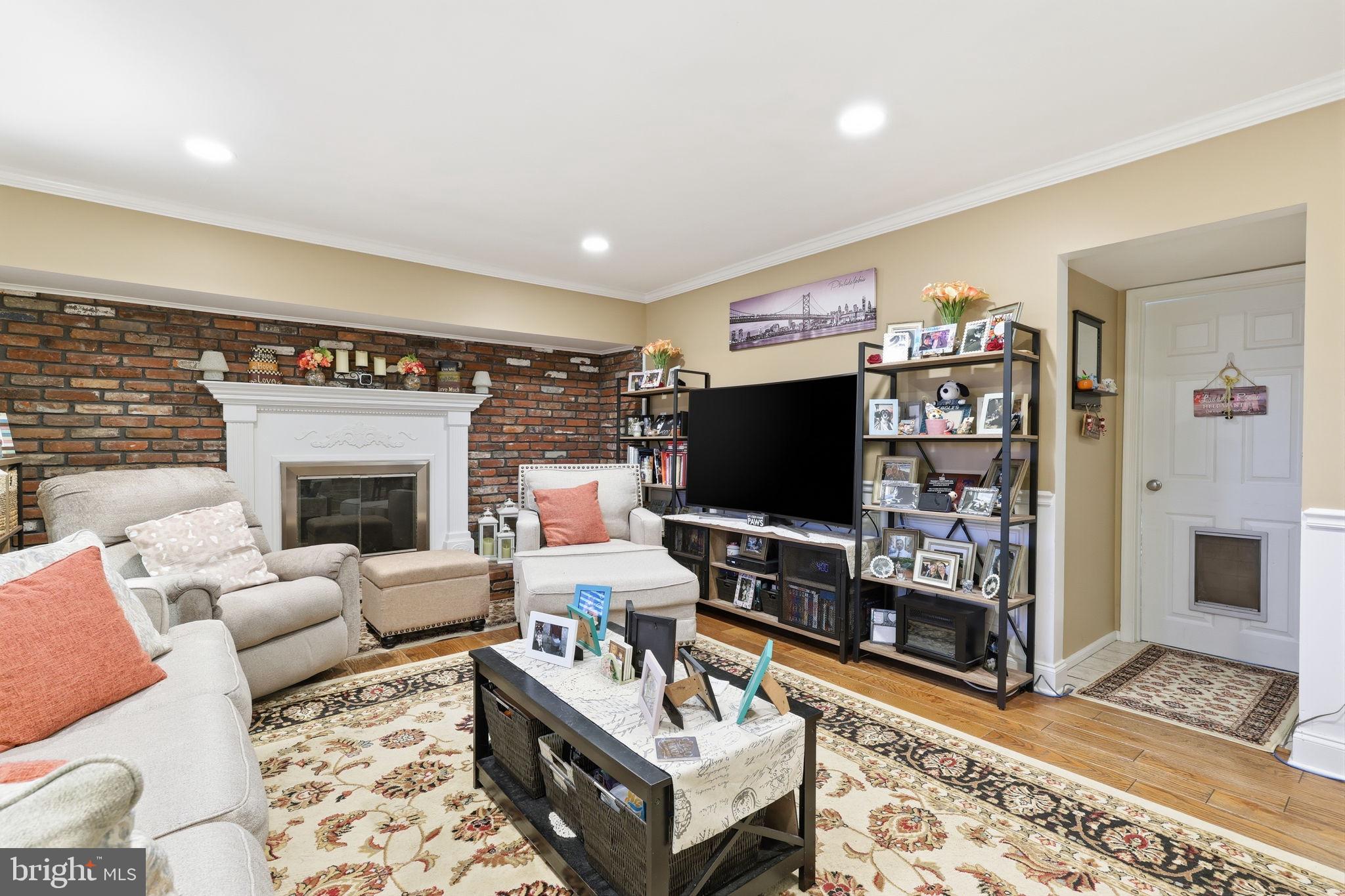 103 Greenvale Road Cherry Hill, NJ 08034 - Photo 17 of 36 a living room with furniture and a flat screen tv