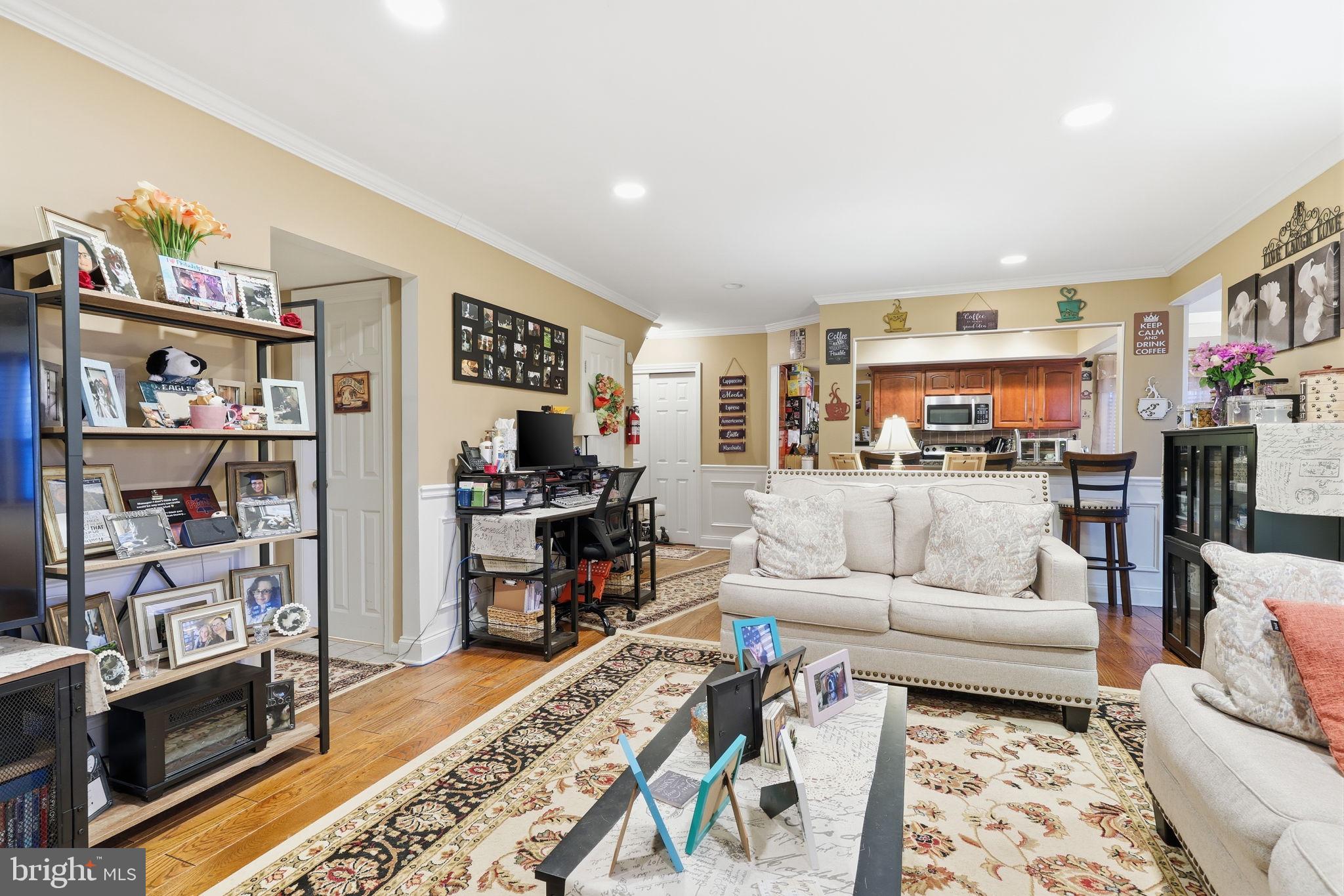 103 Greenvale Road Cherry Hill, NJ 08034 - Photo 18 of 36 a living room with furniture and a wooden floor