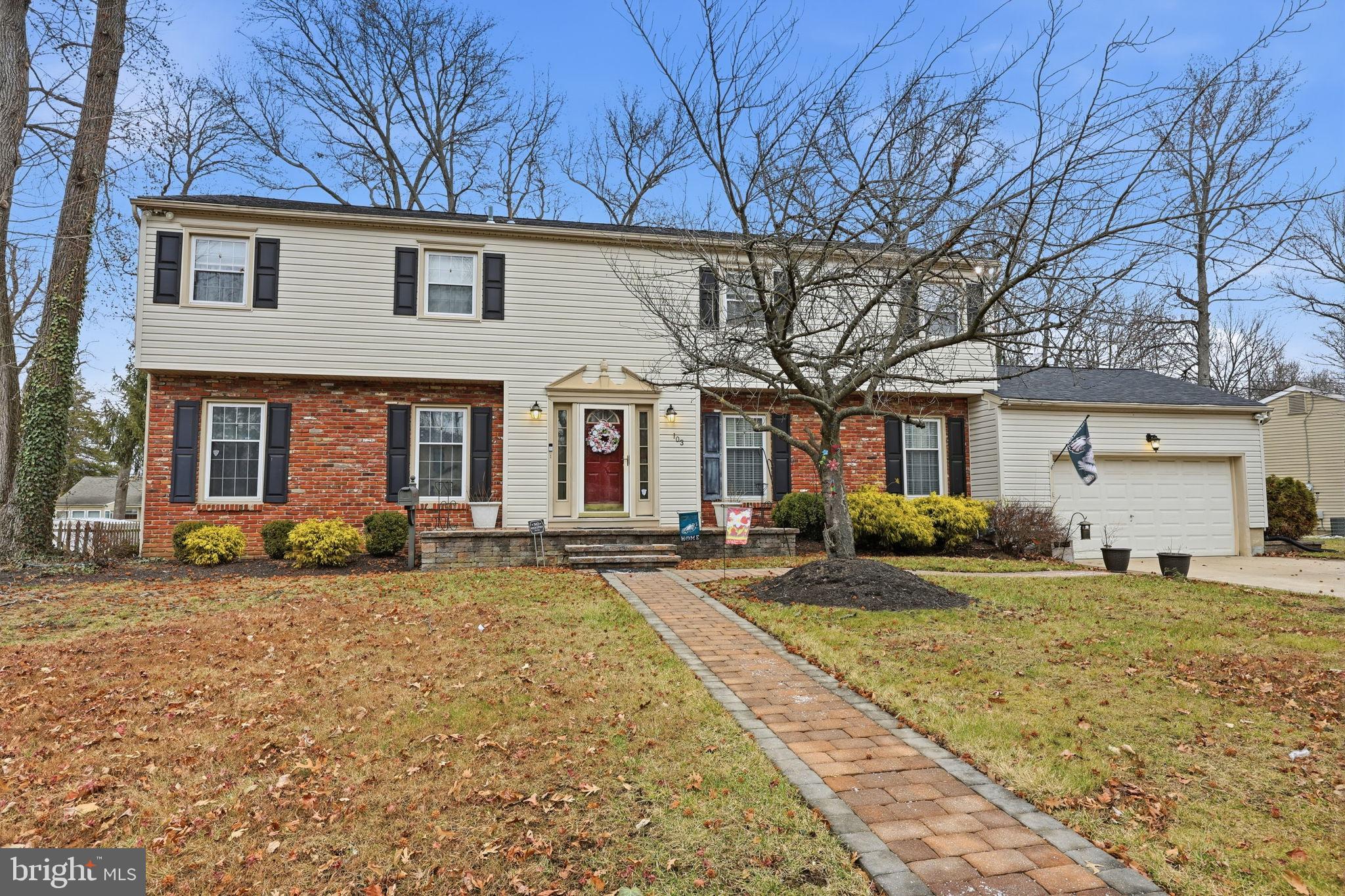 103 Greenvale Road Cherry Hill, NJ 08034 - Photo 2 of 36 a front view of a house with a yard and porch