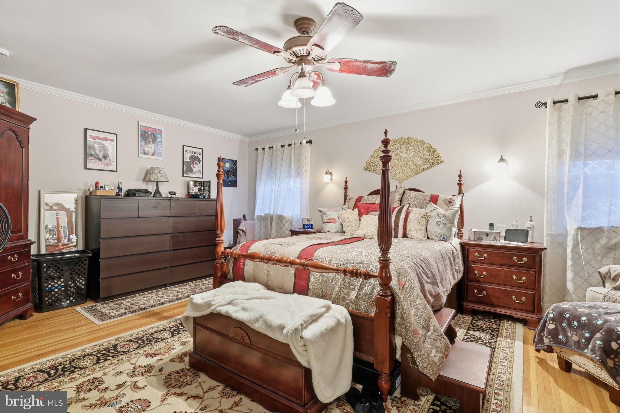 103 Greenvale Road Cherry Hill, NJ 08034 - Photo 24 of 36 a bedroom with bed and wooden floor