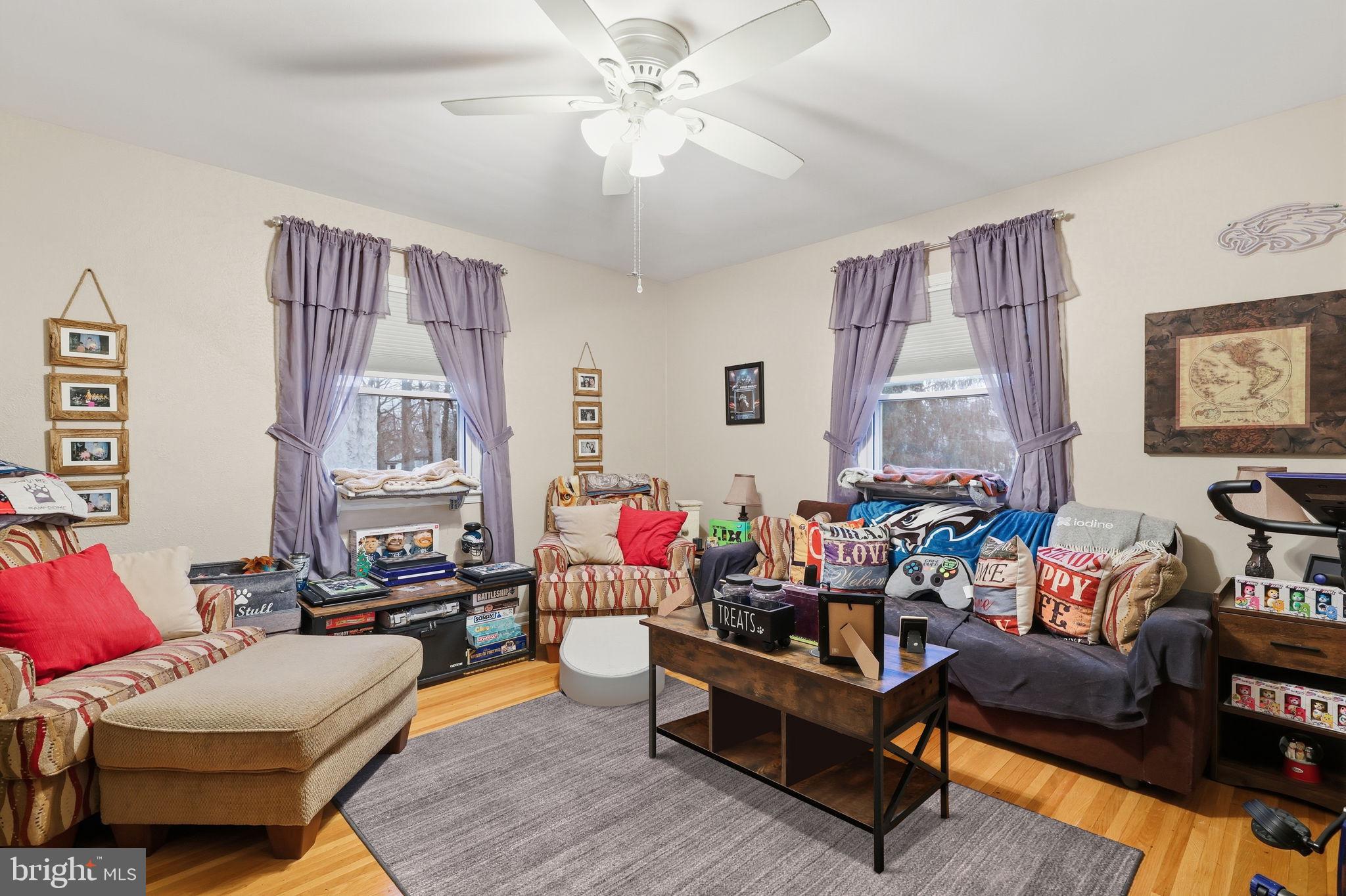 103 Greenvale Road Cherry Hill, NJ 08034 - Photo 28 of 36 a living room with furniture and a large window