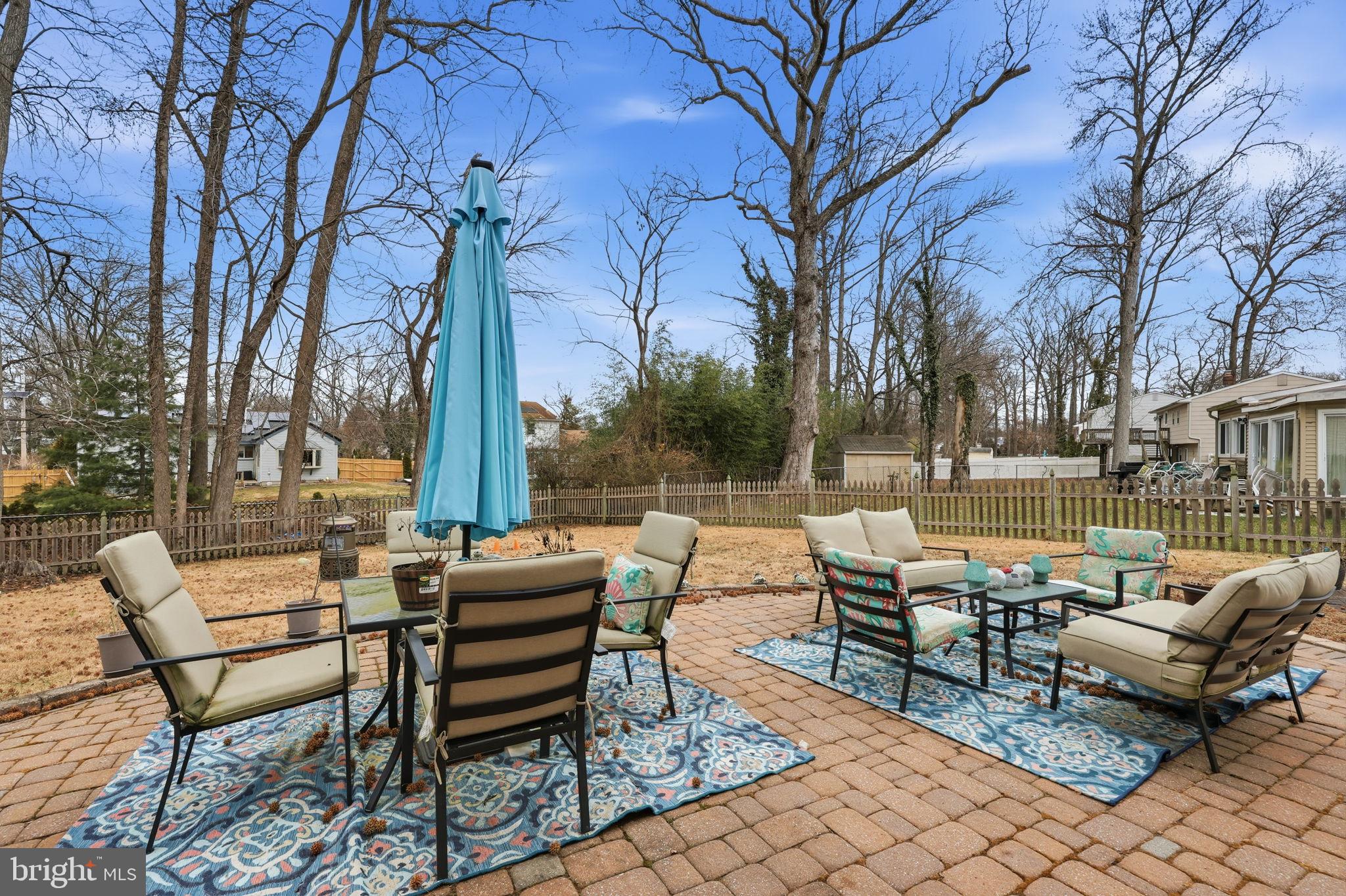 103 Greenvale Road Cherry Hill, NJ 08034 - Photo 32 of 36 a view of a patio with couches and a fire pit