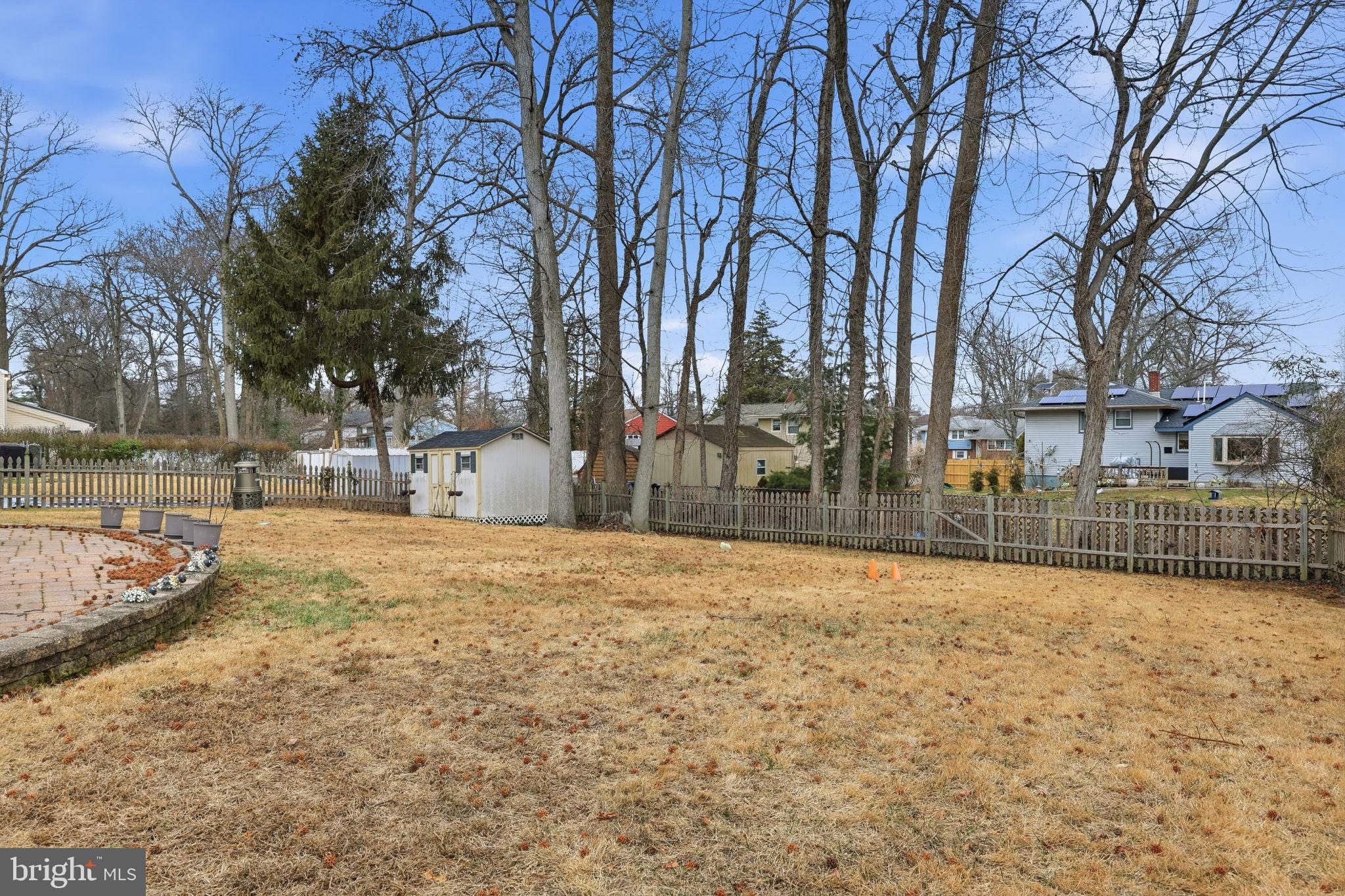 103 Greenvale Road Cherry Hill, NJ 08034 - Photo 35 of 36 a view of a yard with snow on the road
