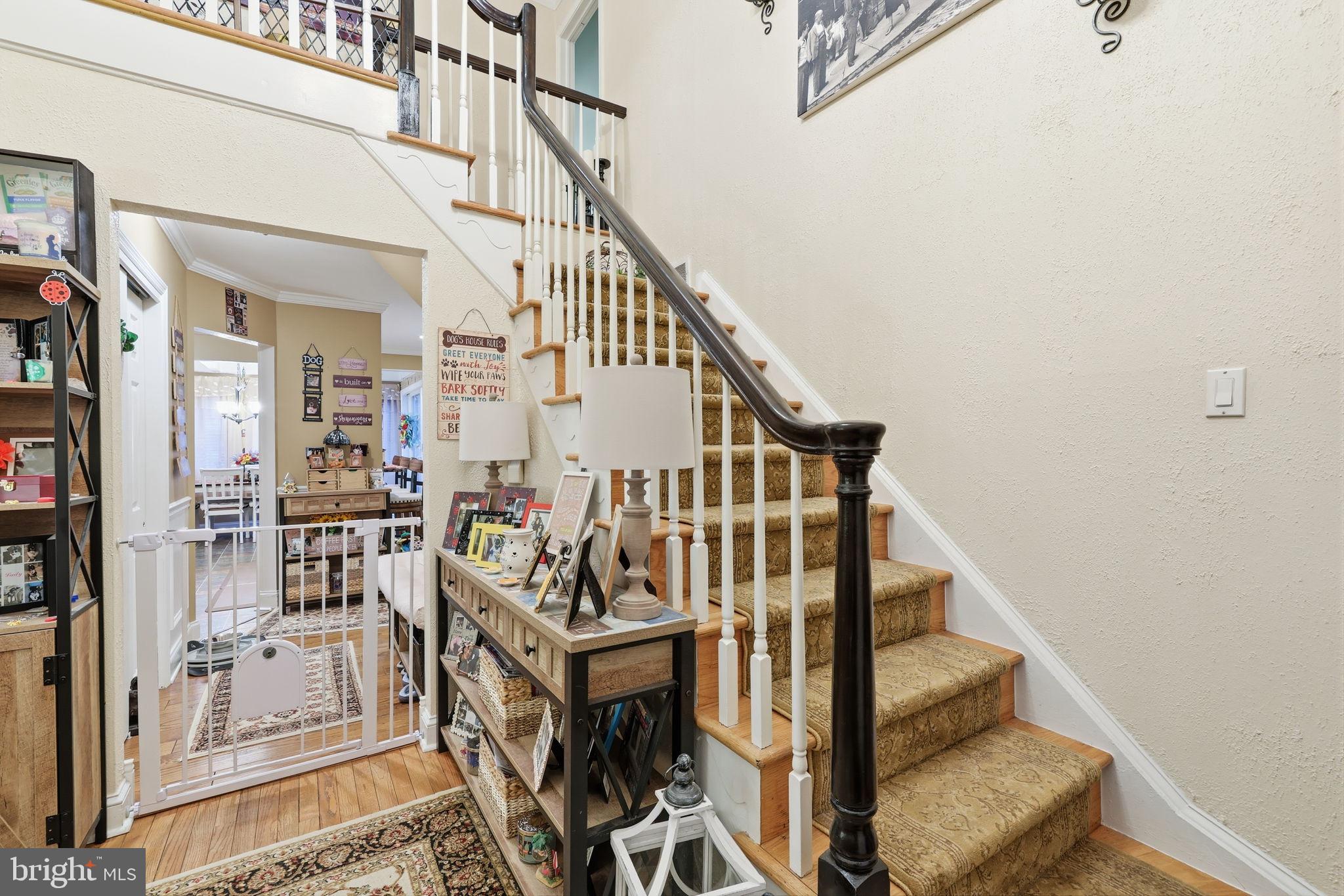 103 Greenvale Road Cherry Hill, NJ 08034 - Photo 5 of 36 a view of entryway livingroom and hall with wooden floor