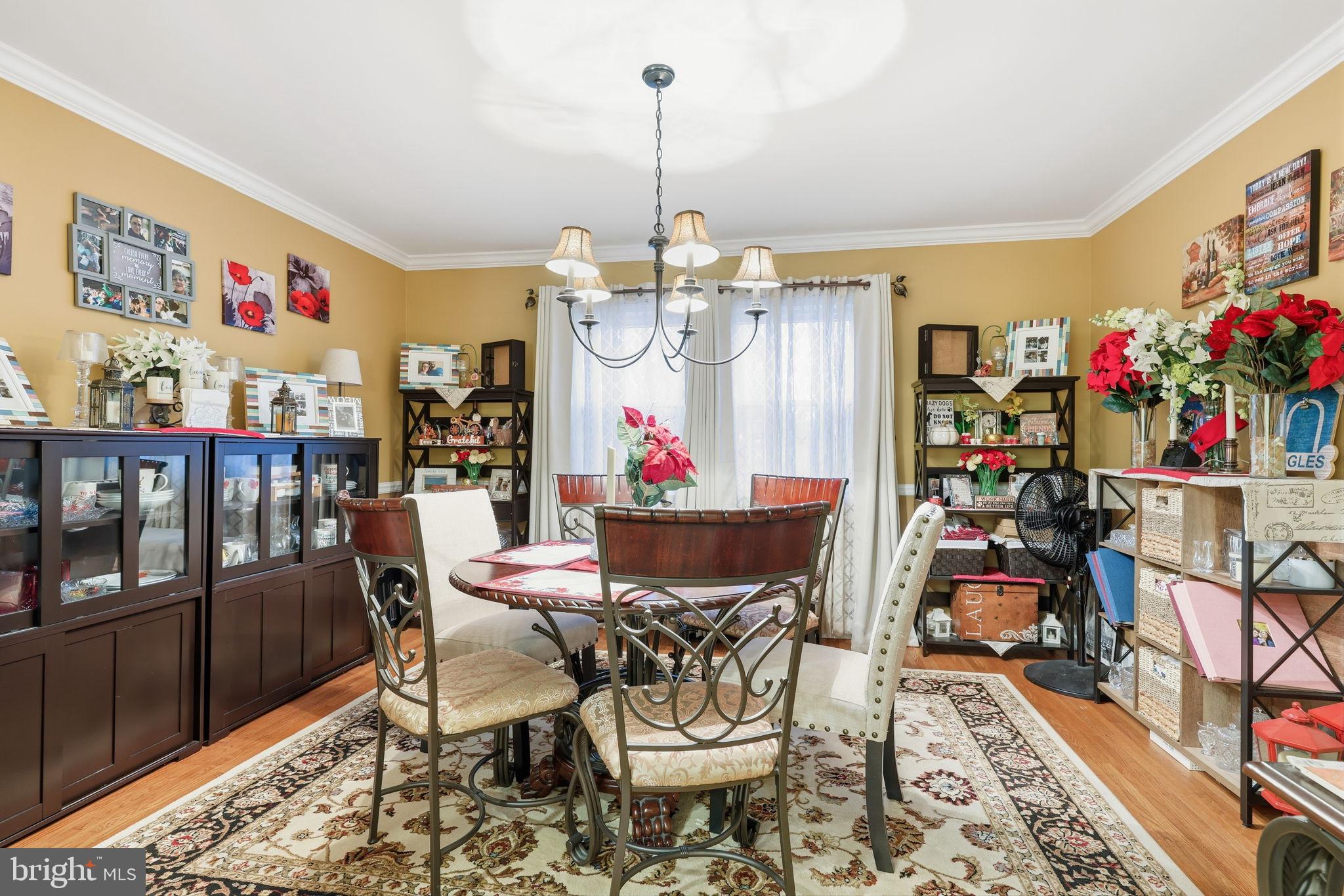 103 Greenvale Road Cherry Hill, NJ 08034 - Photo 9 of 36 a view of a dining room with furniture window and wooden floor