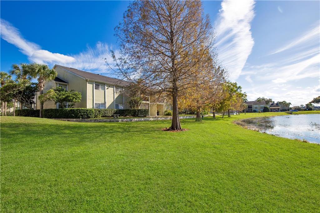 912 Lake Destiny Road, Unit H Altamonte Springs, FL 32714 - Photo 1 of 1 a view of a house with a big yard