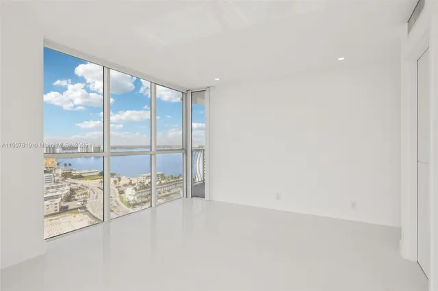 a view of an empty room and window