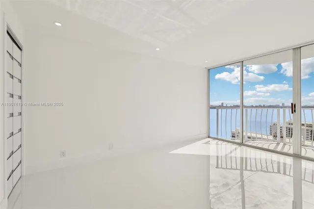 a view of hallway with a large window