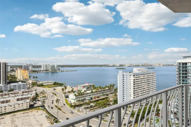 a view of a balcony with an ocean view
