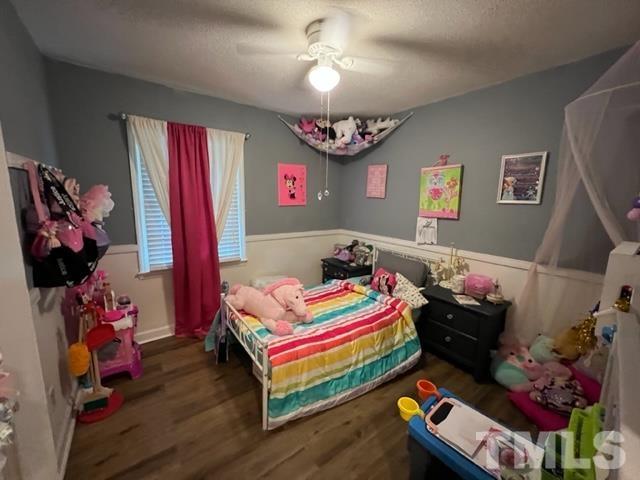 866 Lane Road Dunn, NC 28334 - Photo 20 of 41 a room with toys and a wooden floor