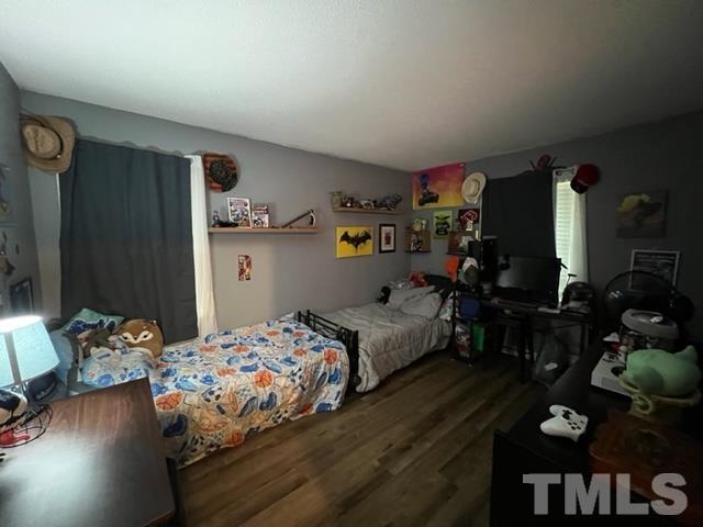 866 Lane Road Dunn, NC 28334 - Photo 21 of 41 a bedroom with bed and a window