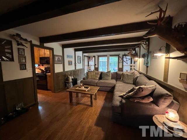 866 Lane Road Dunn, NC 28334 - Photo 3 of 41 a living room with furniture and a flat screen tv