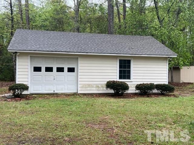 866 Lane Road Dunn, NC 28334 - Photo 32 of 41 a view of a house with a yard