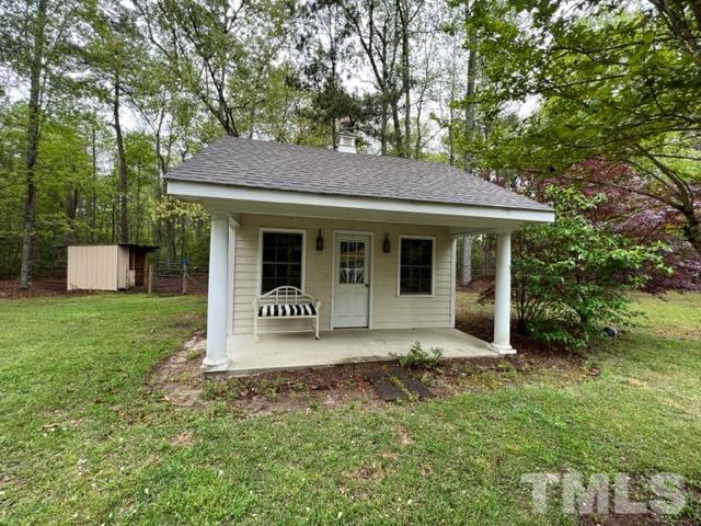 866 Lane Road Dunn, NC 28334 - Photo 34 of 41 a front view of a house with garden