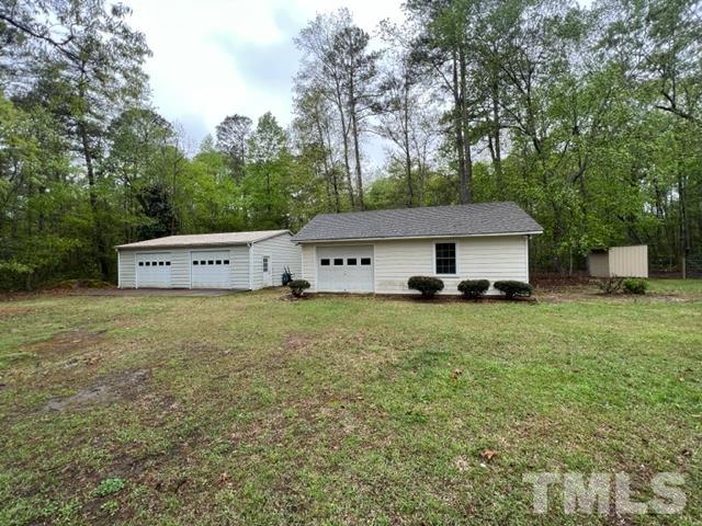 866 Lane Road Dunn, NC 28334 - Photo 38 of 41 a front view of a house with a yard and tree