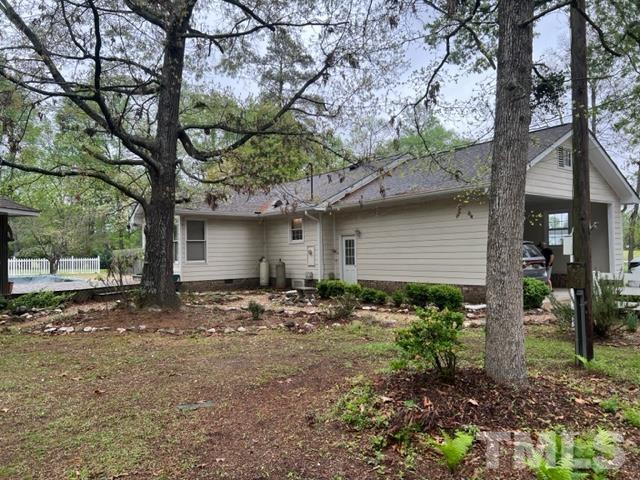 866 Lane Road Dunn, NC 28334 - Photo 39 of 41 a front view of a house with garden