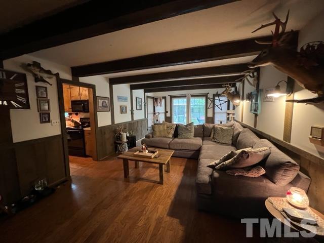 866 Lane Road Dunn, NC 28334 - Photo 6 of 41 a living room with furniture and a flat screen tv