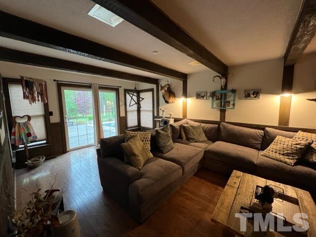 866 Lane Road Dunn, NC 28334 - Photo 7 of 41 a living room with furniture and a flat screen tv