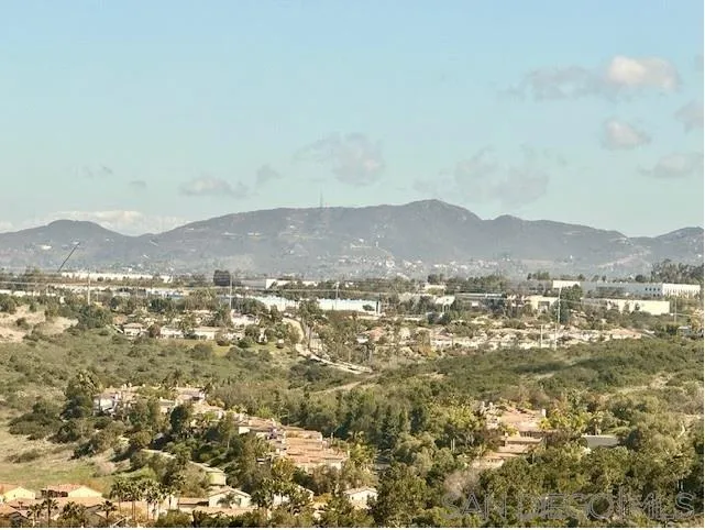 a view of a city and mountains