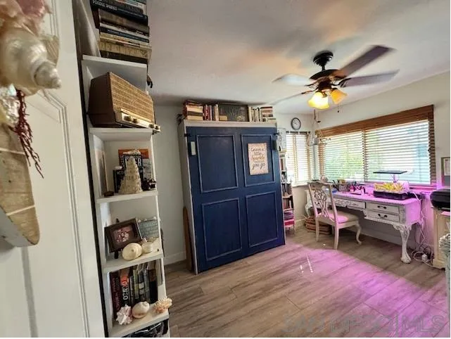 6522 Corte Montecito Carlsbad, CA 92009 - Photo 14 of 29 a bedroom with furniture and a window