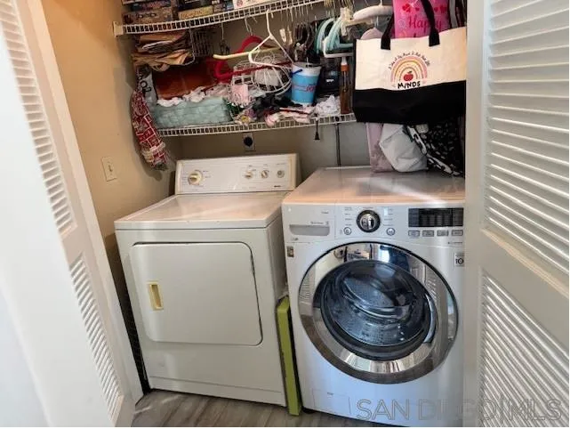 6522 Corte Montecito Carlsbad, CA 92009 - Photo 15 of 29 a utility room with dryer and washer