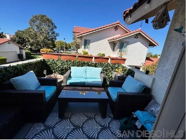6522 Corte Montecito Carlsbad, CA 92009 - Photo 19 of 29 a view of a backyard with sitting area