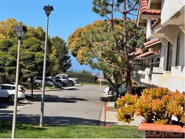 6522 Corte Montecito Carlsbad, CA 92009 - Photo 20 of 29 a view of a house with a yard