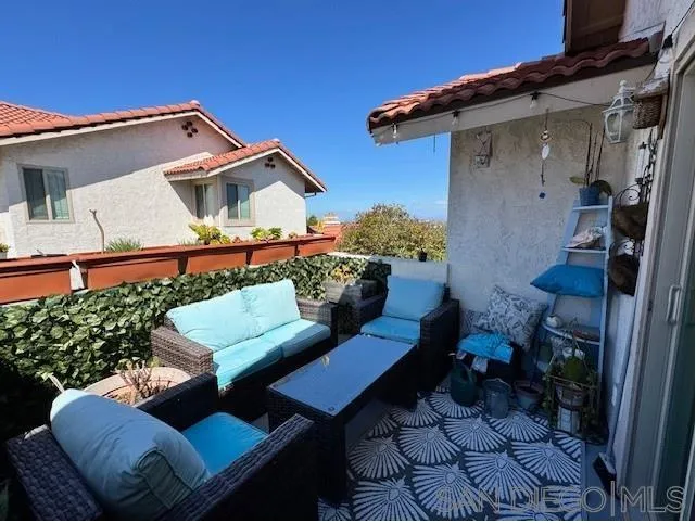 6522 Corte Montecito Carlsbad, CA 92009 - Photo 22 of 29 a view of a house with backyard and sitting area
