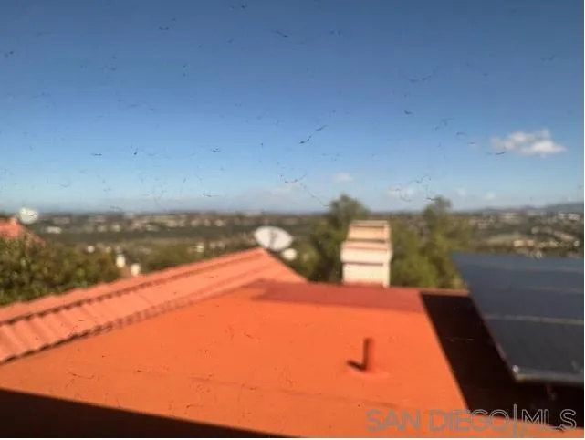 6522 Corte Montecito Carlsbad, CA 92009 - Photo 23 of 29 a view of a ocean with a mountain view