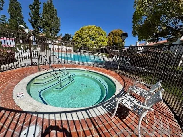 6522 Corte Montecito Carlsbad, CA 92009 - Photo 25 of 29 a view of swimming pool with outdoor seating