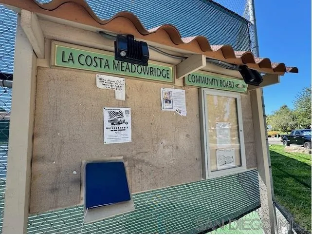 6522 Corte Montecito Carlsbad, CA 92009 - Photo 26 of 29 a view of a door and brick walls