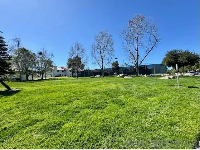 6522 Corte Montecito Carlsbad, CA 92009 - Photo 28 of 29 a garden with trees in front of it