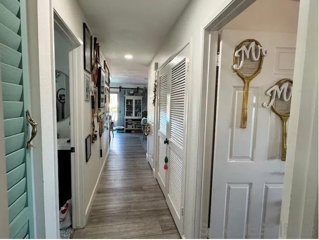 6522 Corte Montecito Carlsbad, CA 92009 - Photo 6 of 29 a view of hallway with wooden floor
