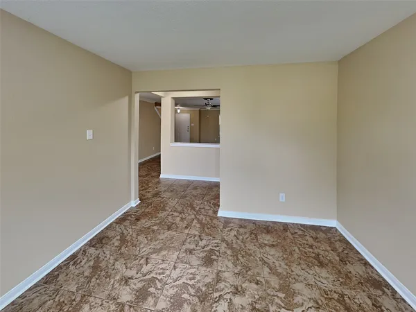 an empty room with a natural light