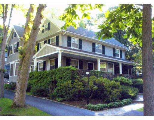 72 Abbott Road Wellesley, MA 02481 - Photo 1 of 18 a front view of a house with garden