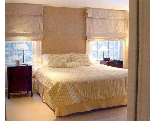 72 Abbott Road Wellesley, MA 02481 - Photo 12 of 18 a bedroom with a bed and a window