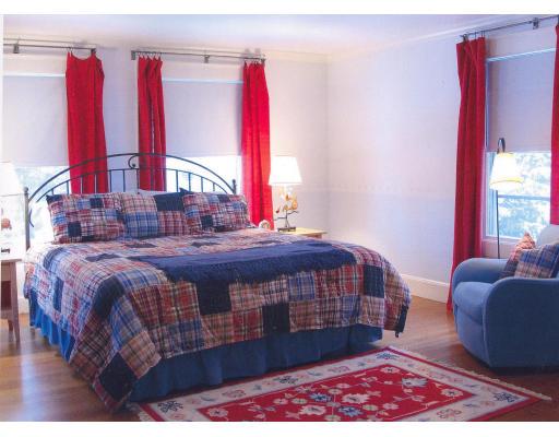 72 Abbott Road Wellesley, MA 02481 - Photo 15 of 18 a bedroom with a bed and a window