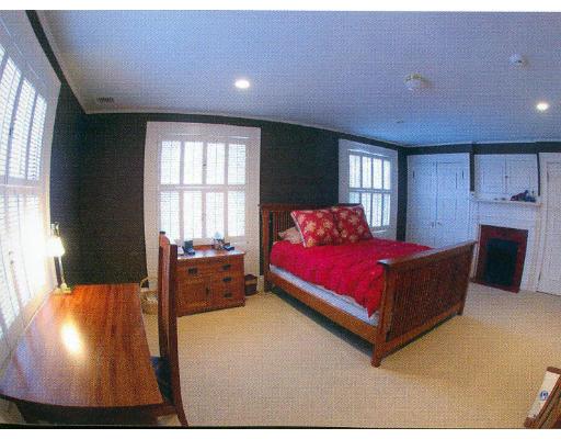 72 Abbott Road Wellesley, MA 02481 - Photo 16 of 18 a bedroom with a bed and window