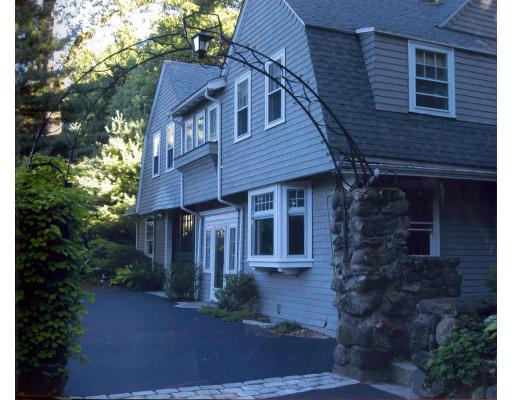 72 Abbott Road Wellesley, MA 02481 - Photo 2 of 18 a front view of a house with garden